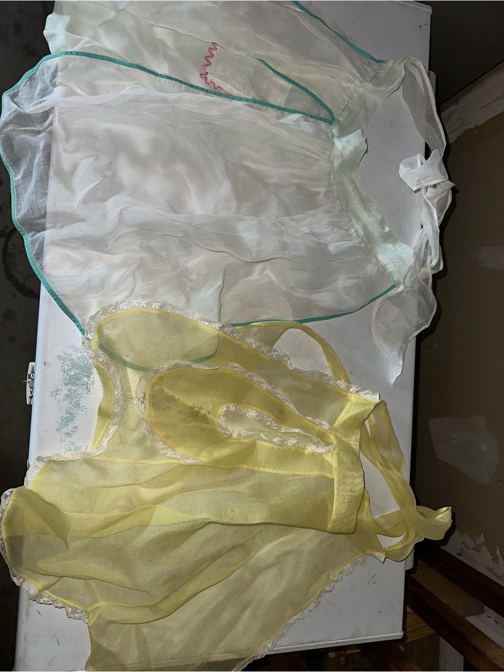 vintage 1950s or 1960s sheer hostess aprons